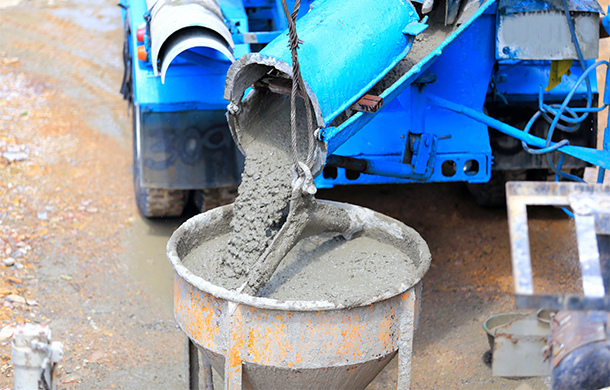 pouring of concrete beside the road